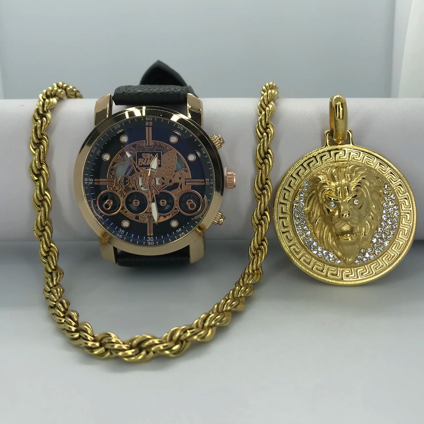 lazo + leon con reloj oro laminado