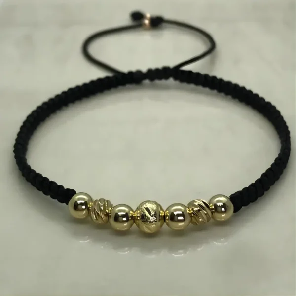 Manilla tejida trío dorado