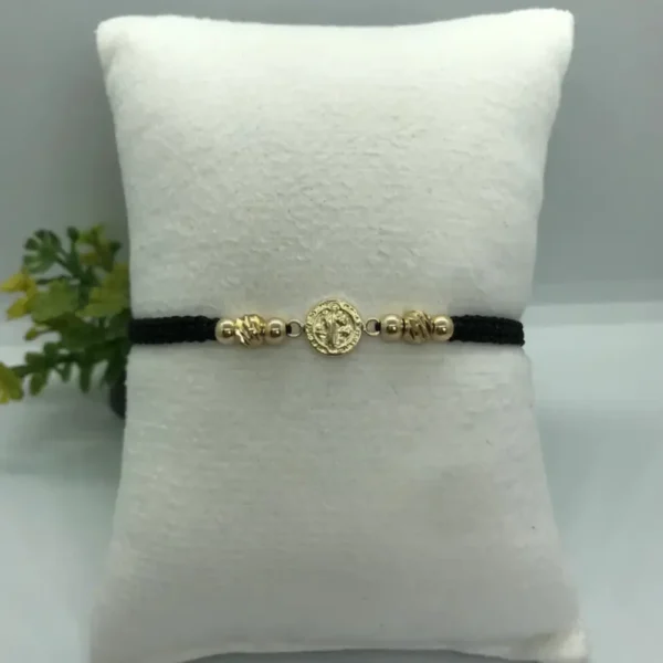 Manilla tejida de San Benito en oro laminado 18k