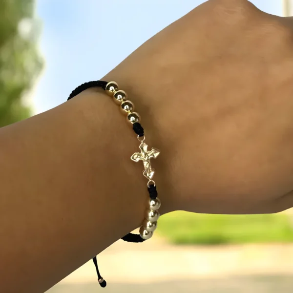 Manilla tejida cruz punta diamante en oro laminado 18k