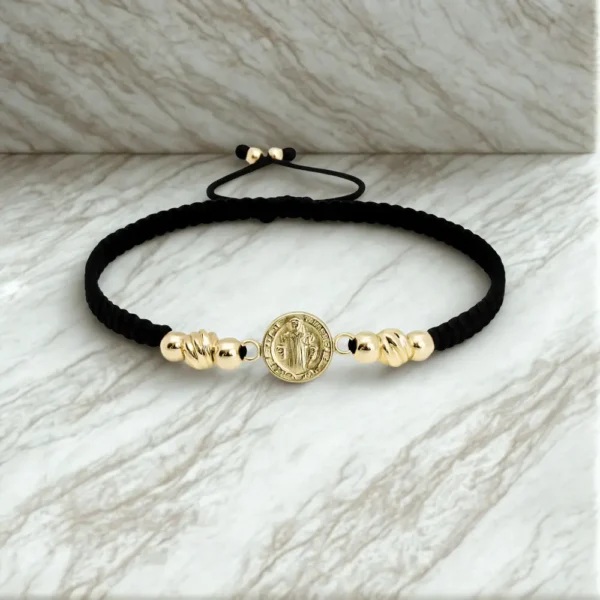 Manilla tejida de San Benito en oro laminado 18k