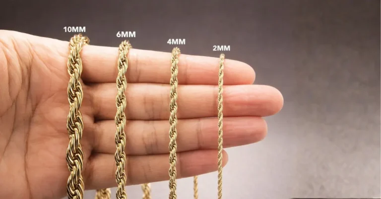 Vale La Pena Comprar oro laminado, mano con cadenas