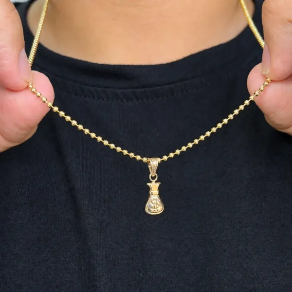 Dije Bolsa de Dinero en Oro Laminado 18K